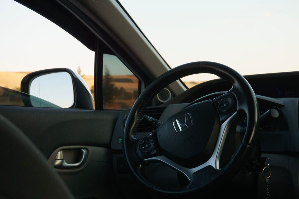Why does my car make knocking noise when driving?