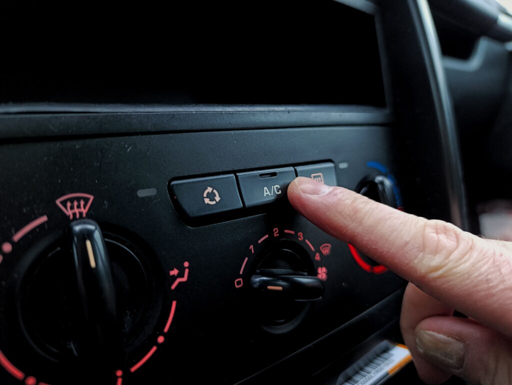 Why does my car vibrate when AC is on?