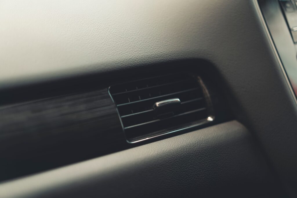 Why does my car overheat due to air in system?